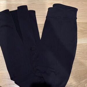 Alo black flare yoga pants with slits at bottom. Small. Good used Condition